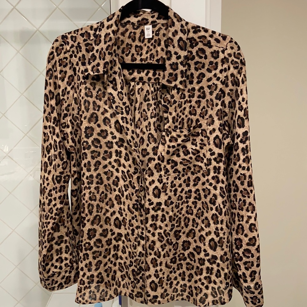 Leopard button down blouse. Nearly sheer.